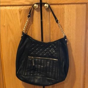 Black leather with gold chain accents